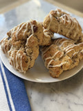 Maple Pecan Scones with maple glaze drizzle, close-up